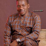 Comr. Augustine Baye
